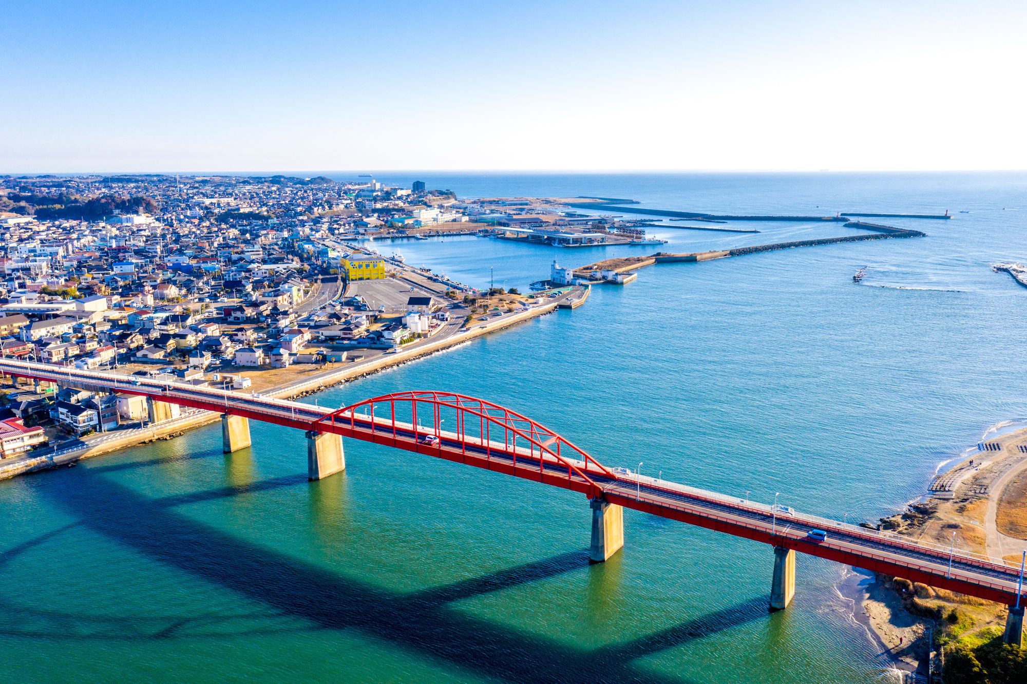 Kaimon Bridge crossing the mouth of the Naka River, with Nakaminato fishing harbour on the near bank